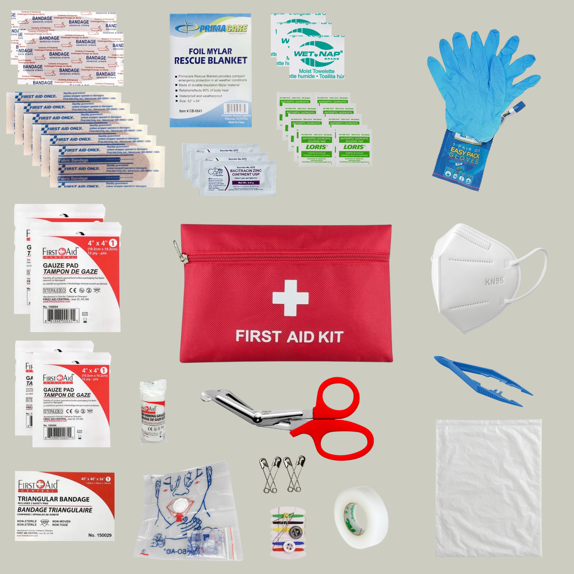 Collection of first aid supplies including a red first aid kit on a grey background.