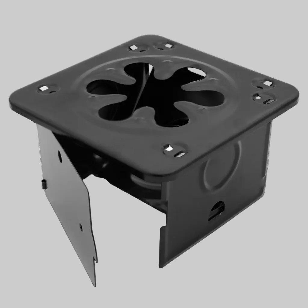 Black metal folding stove on a gray background