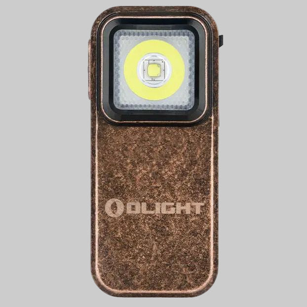 A Olight Oclip Clip Light by Urban Go Prep