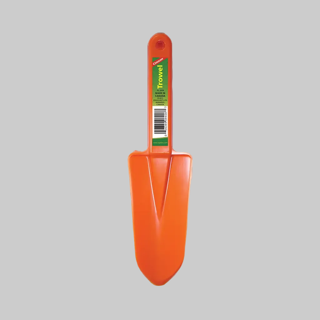 Orange camp trowel with a label on a gray background
