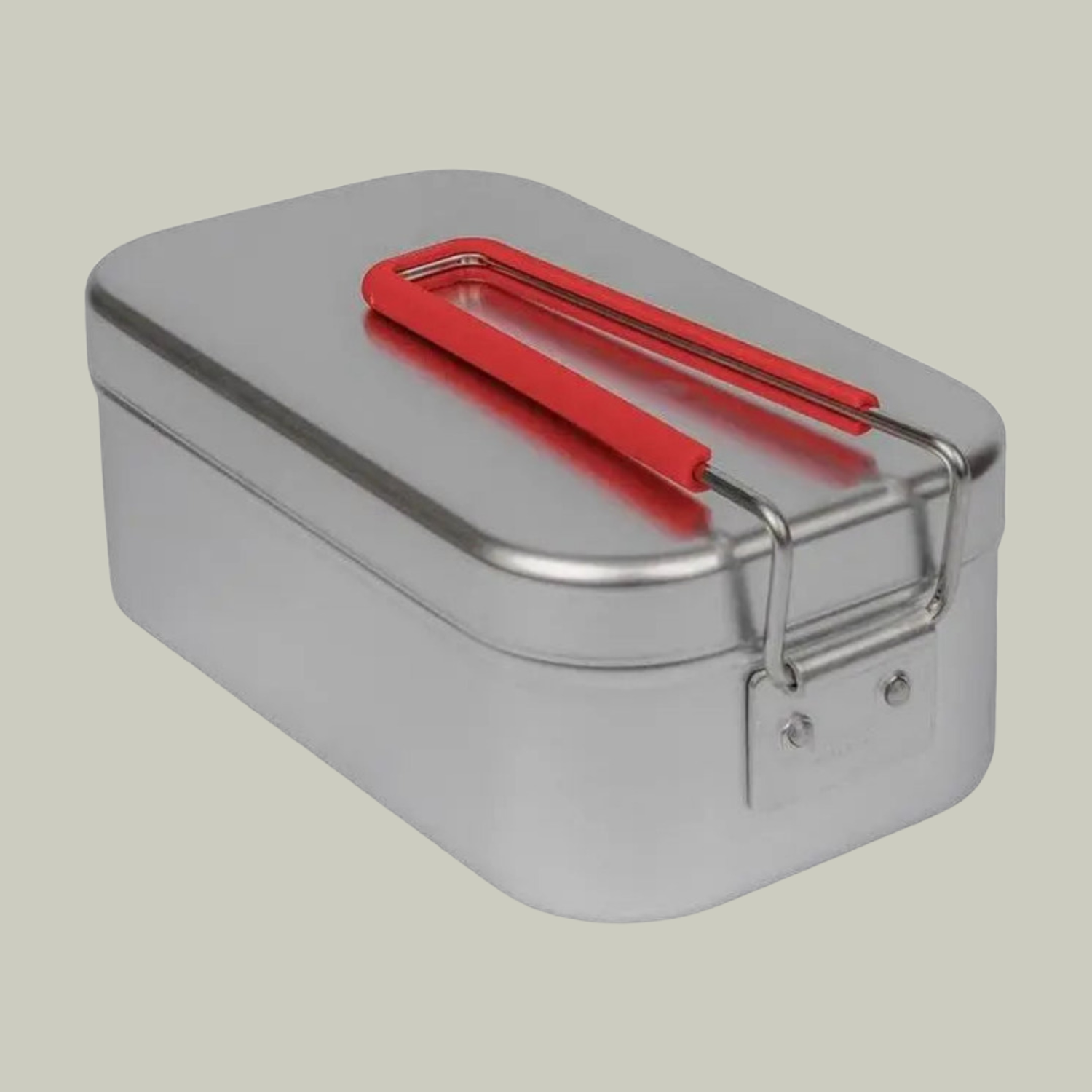 Metal  mess tin box with a red handle on a light gray background