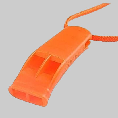 Orange whistle with a rope on a gray background