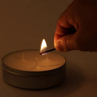 Survival Candle portable emergency heat and light source
